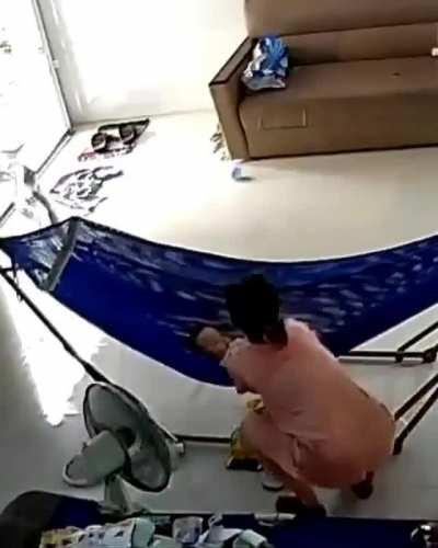 A Mother And A Baby’s Nap Disturbed By A Large Snake