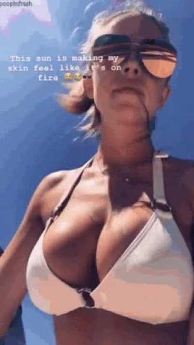 The sun is making her tits look fucking perfect