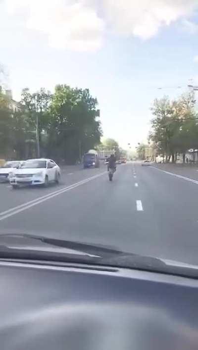 An idiot in a bike