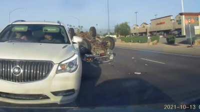 Idiot flips his truck over for no reason.