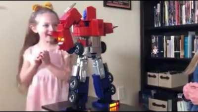 Little girl with her new toy