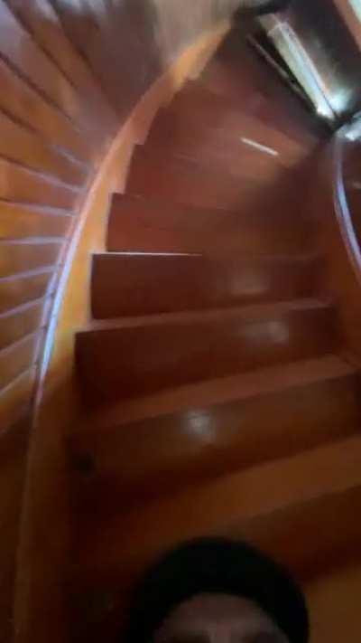 Walking downstairs, upside down, right side up.