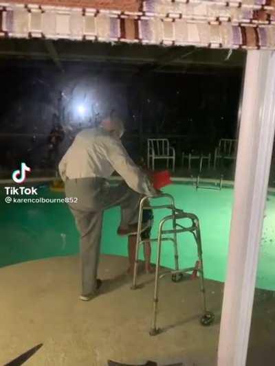Grandpa kicks his great-great grandson into the pool