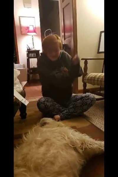 My sister doing her best to become a velociraptor