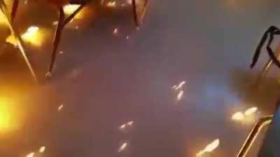 Professor demonstrate chemistry experiment on liquid methane