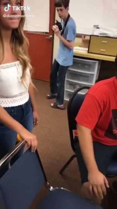 Kid taking pics of classmate’s feet