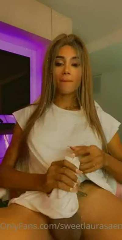 She tries her best to hide that huge thing!