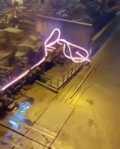 1300 C (2372 F) girder gets rolled and out of the line