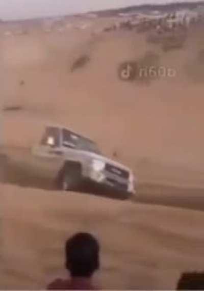 Arab man uses the force to stop a car from flipping
