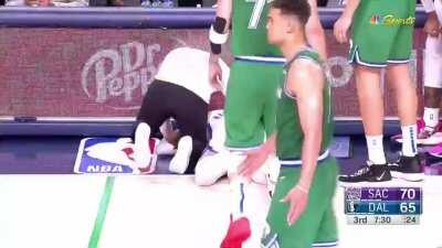 [Highlight] Tyrese Haliburton goes down injured after he trips over a defender's feet.