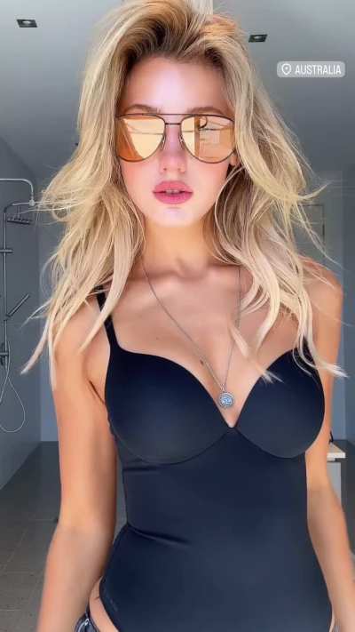 Hot Jemima Robinson²⁰ with beautiful hairstyle and pilot glasses