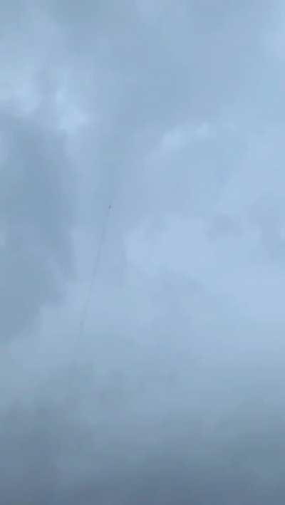 A lightning triggered by a missile with a conducting cable