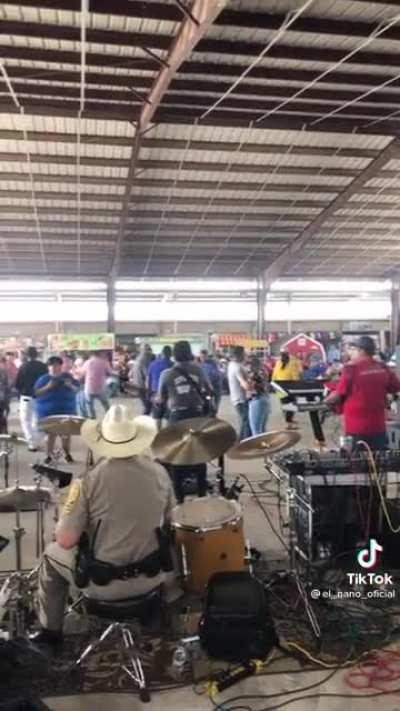 Texas sheriff fills in for drummer.