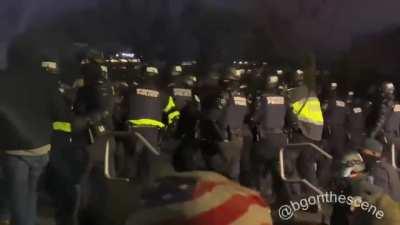 Police are outside the DC Capitol Building now, pushing forward as they try to disperse the remaining crowd.