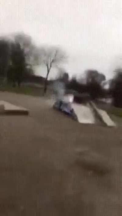 Surrounding a large firecracker in bottles of gasoline