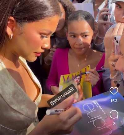 Zendaya signing autographs