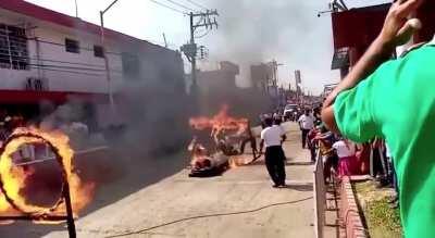 WCGW jumping through a flaming hoop
