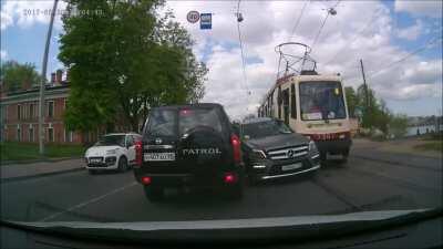 Mercedes-Benz Hit By Tram, Pushed into Nissan Patrol