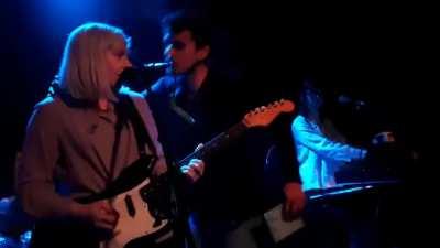 Creep gets on stage and tries to kiss the female singer. Looks surprised when she isn't down for it.