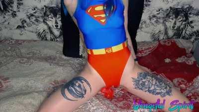 Supergirl cosplay slut masturbates and rides dildo