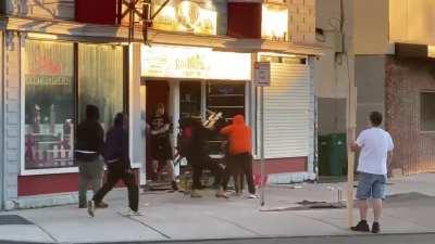 Rioters Attack Female Shop Owner