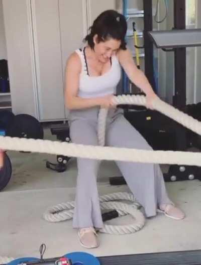Nikki working out and showing off those milkers.