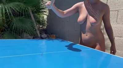 Playing ping pong in the sun.