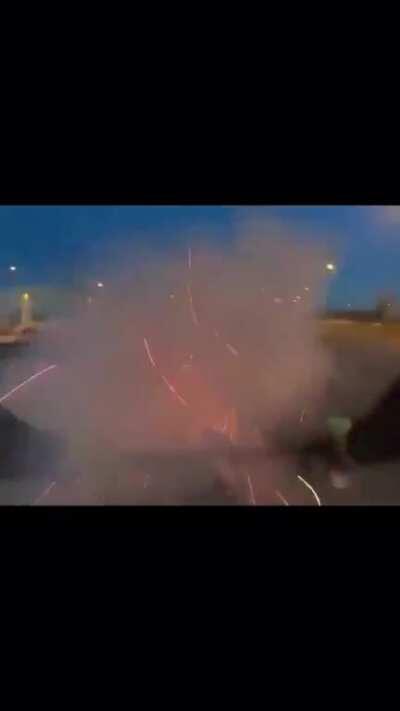 Biker fires firework at another Biker