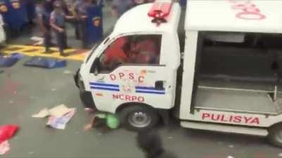 Protesters against American presence in the Philippines get brutalized by government forces.
