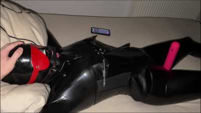 Orgasm during bondage in full latex