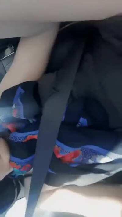 Feeling herself in her car