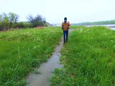 Me and my brother leading each other on a blindfolded hiking trip