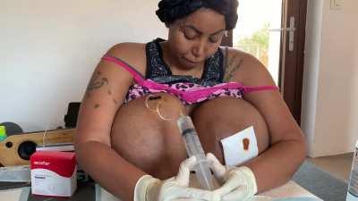 Arlen filling her already giant fake boobs!