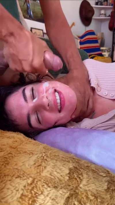 Love the way she maintains eye contact while he uses her face to cum