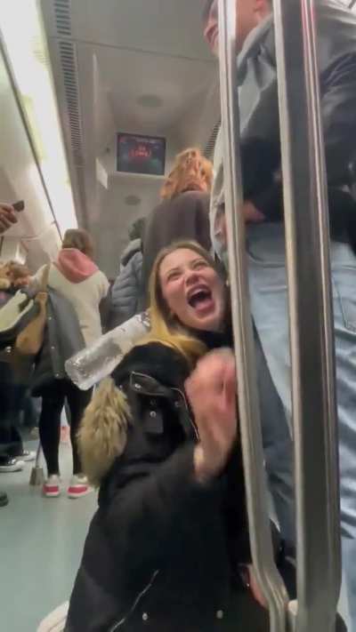 Girl sucks strangers cock in subway during rush hour