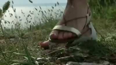 Crawdad stomped into the dirt under sandals