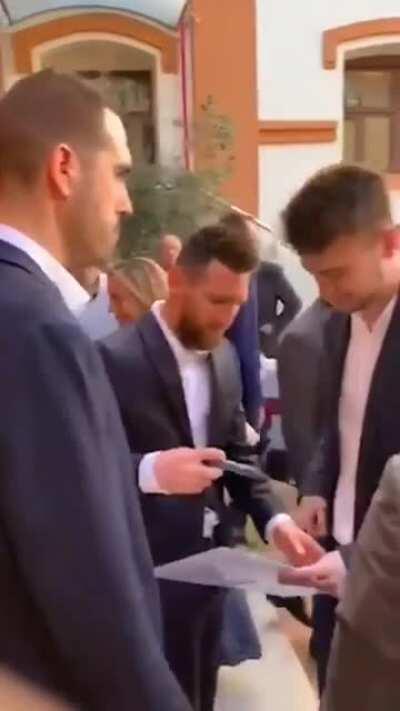 Finally getting a signature of his idol Lionel Messi!