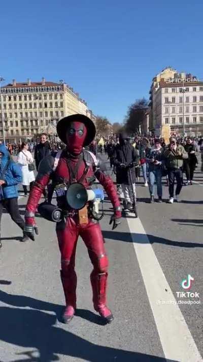 Deadpool leading the protest