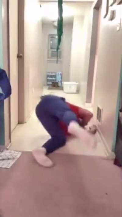 Guy swings a badly tied Coke bottle...