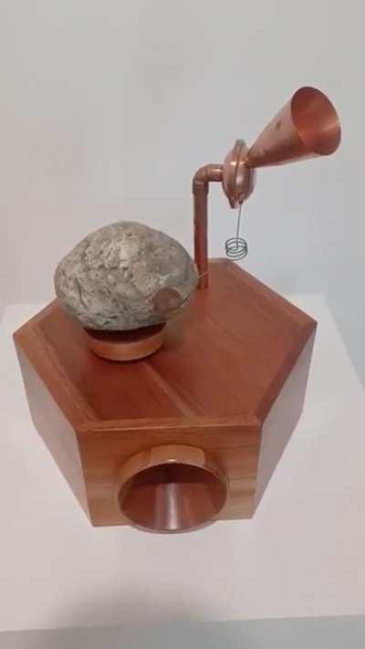 A phonograph that 'reads' and reproduces a rock rough surface.