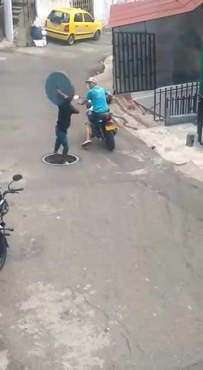Trying to steal a manhole cover