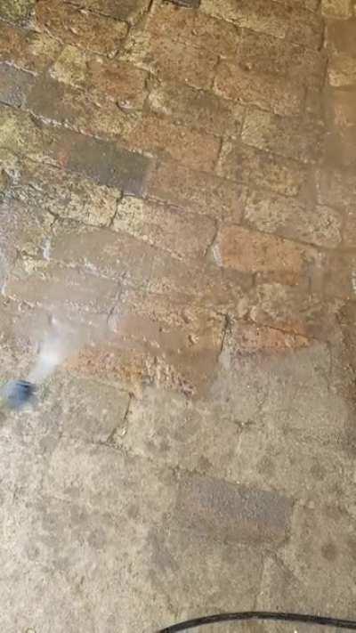 First time using a power washer. Cleaning the driveway for the first time in 20 years!