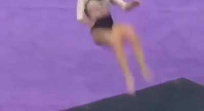 Gymnast gives her knees a workout.