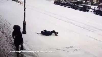 A woman slipped on the ice. Let's rush to help her