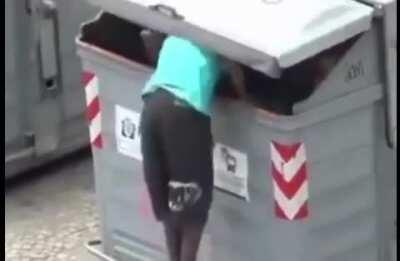 WCGW jumping in a partially opened dumpster