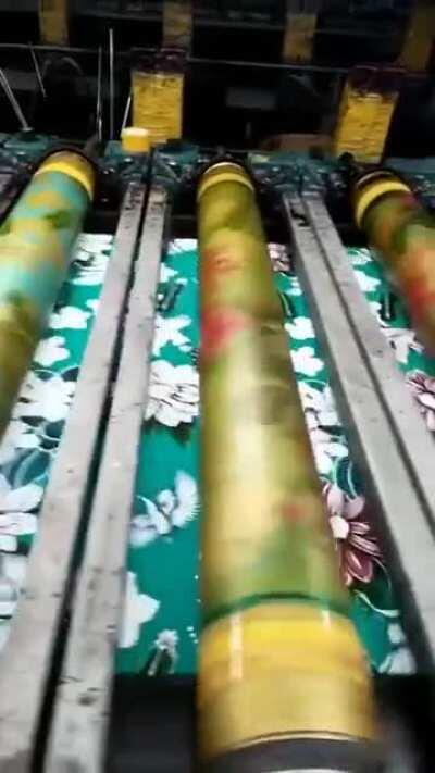 A machine that paint using rollers!
