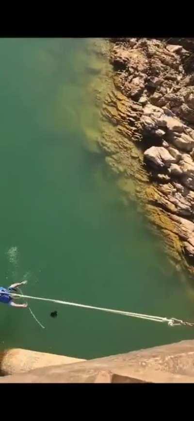 Jumping from a bridge using makeshift equipment 