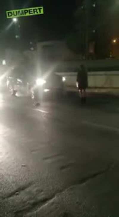 Woman blocks traffic, refuses to move. Cone solves the problem.