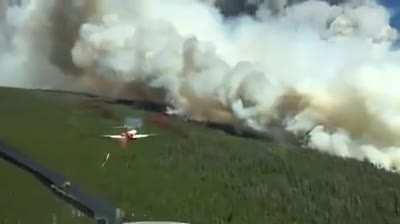Interesting perspective of and AeroTanker adding to the fire line!