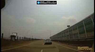 Guy on the bike thought the guy in the car has no balls.